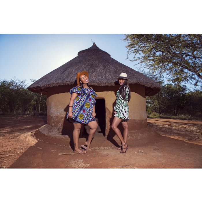 Pedi Rondeval Cultural Roots-Limpopo-Two women standing in front of a Pedi rondavel
